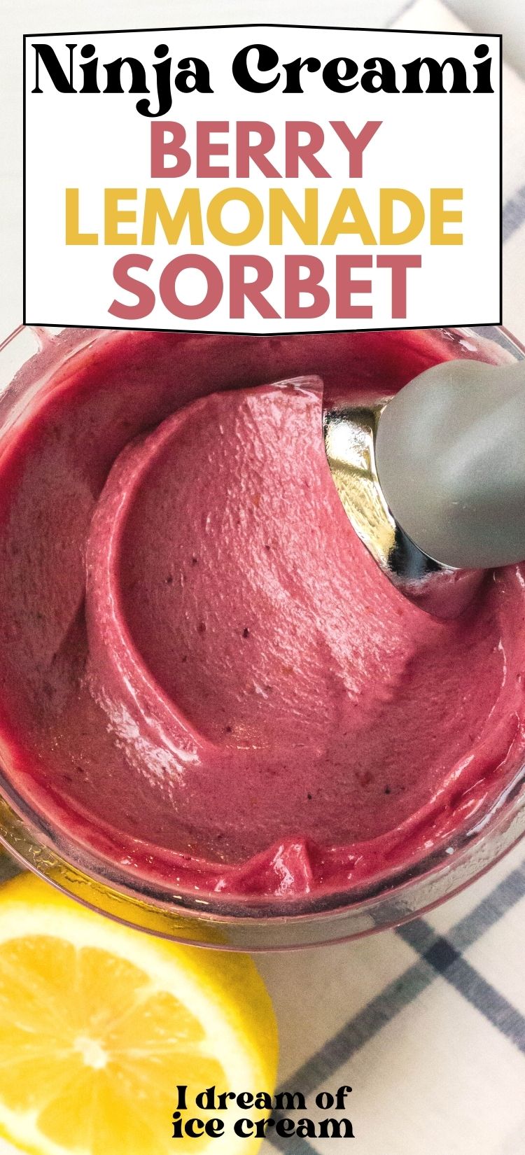 an ice cream scoop swirls the top of berry lemonade sorbet in a ninja creami pint container.