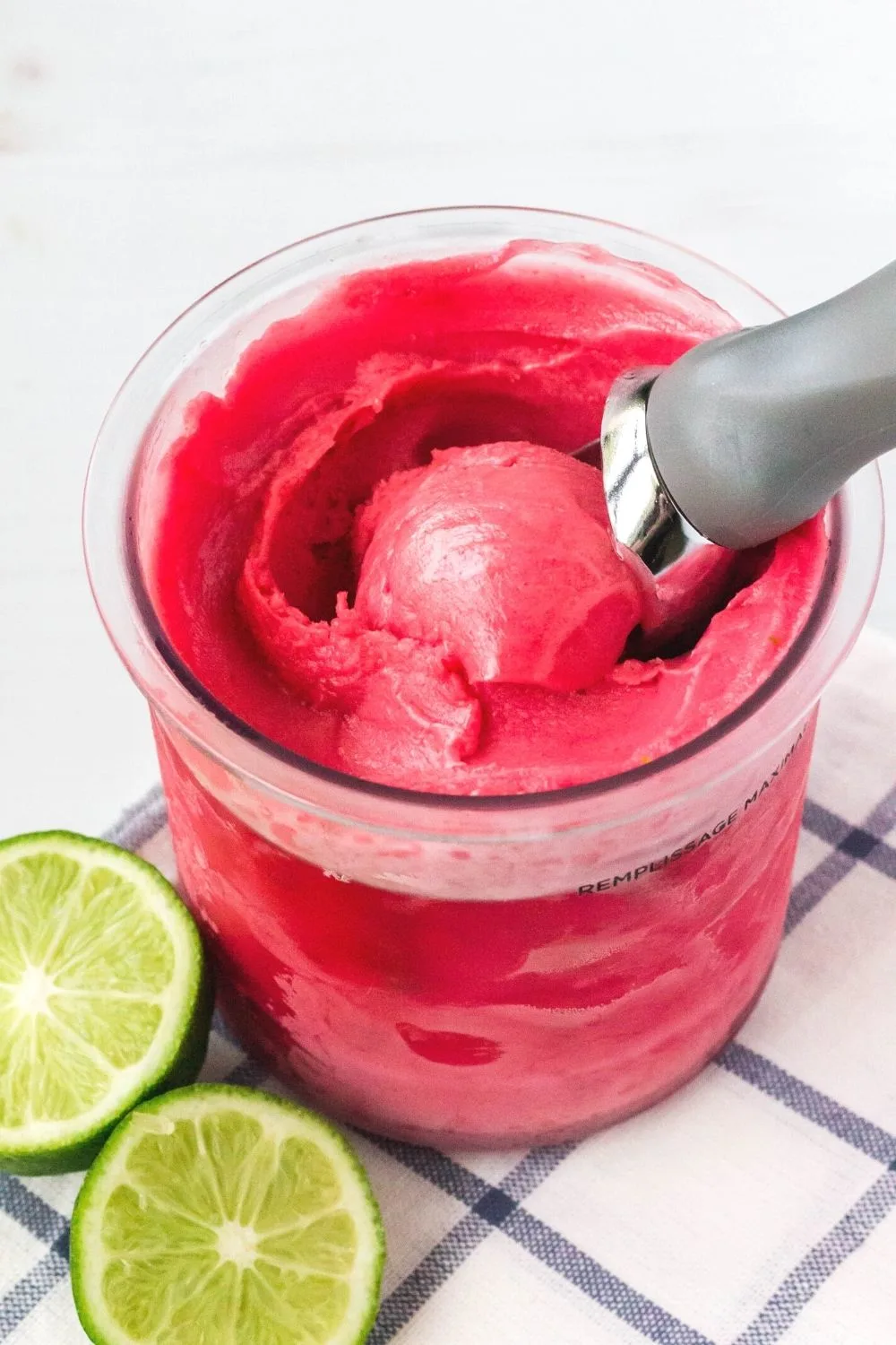 overhead view of a pint of cherry limeade sorbet made in the Ninja Creami machine