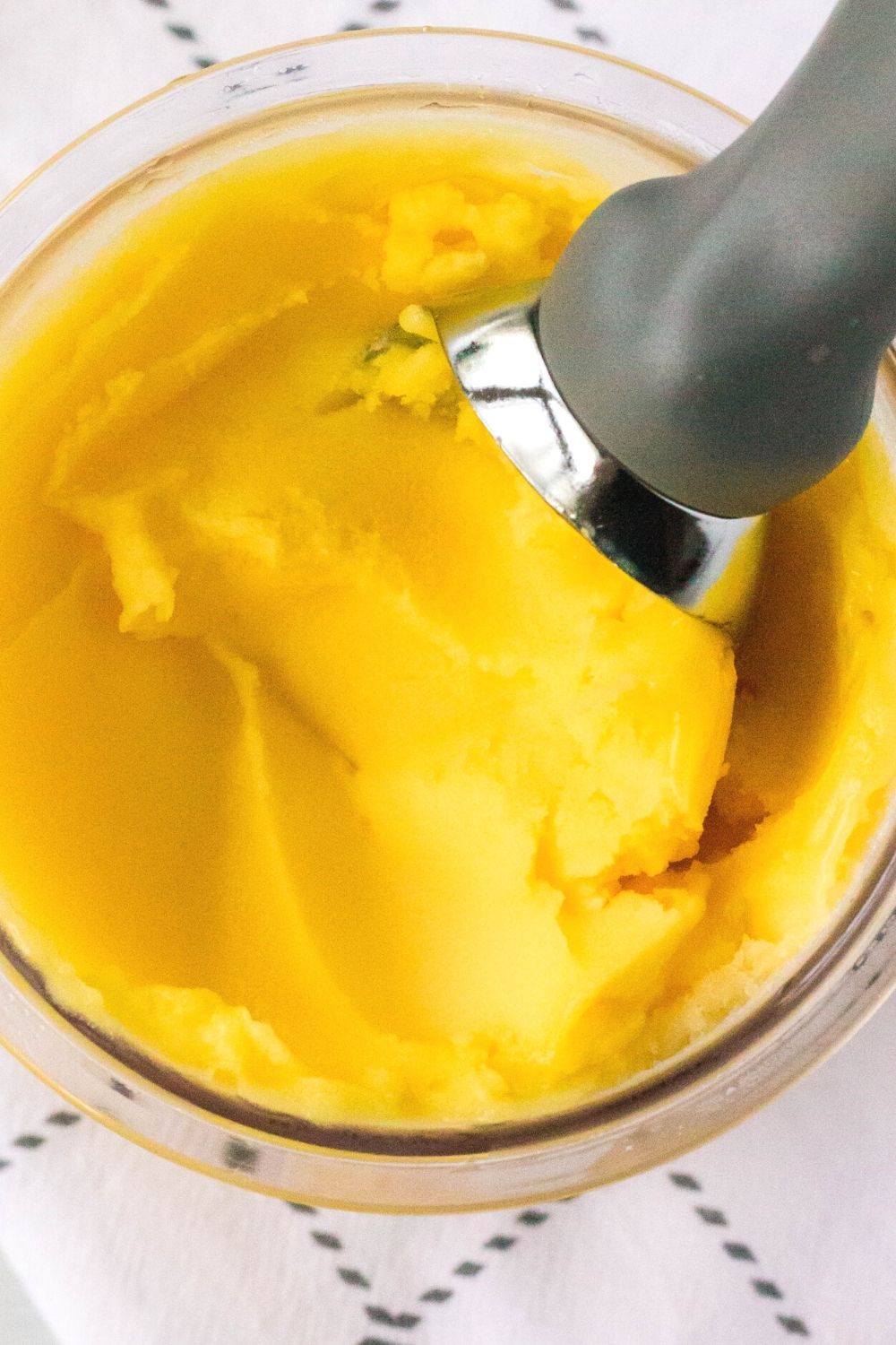 overhead view of mango sorbet made from canned mangoes