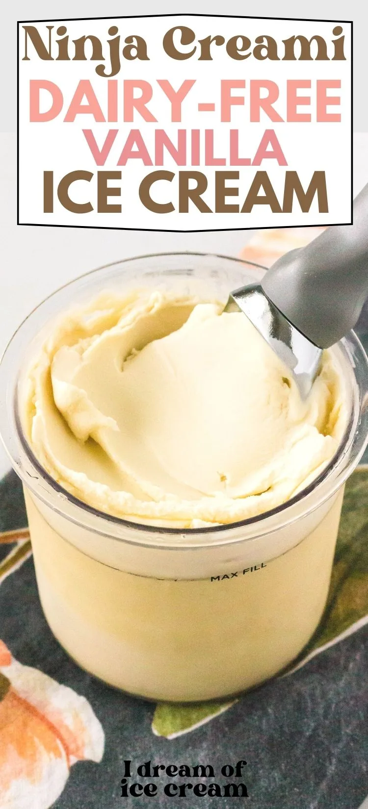 ninja creami pint container filled with dairy-free vanilla ice cream. An ice cream scoop is in the pint.