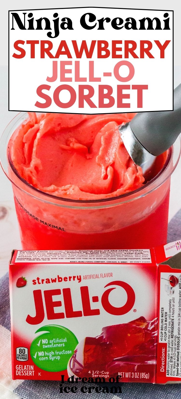 a Ninja Creami pint container of strawberry sorbet with an ice cream scoop in it, along with a box of strawberry Jell-O in front of the pint.