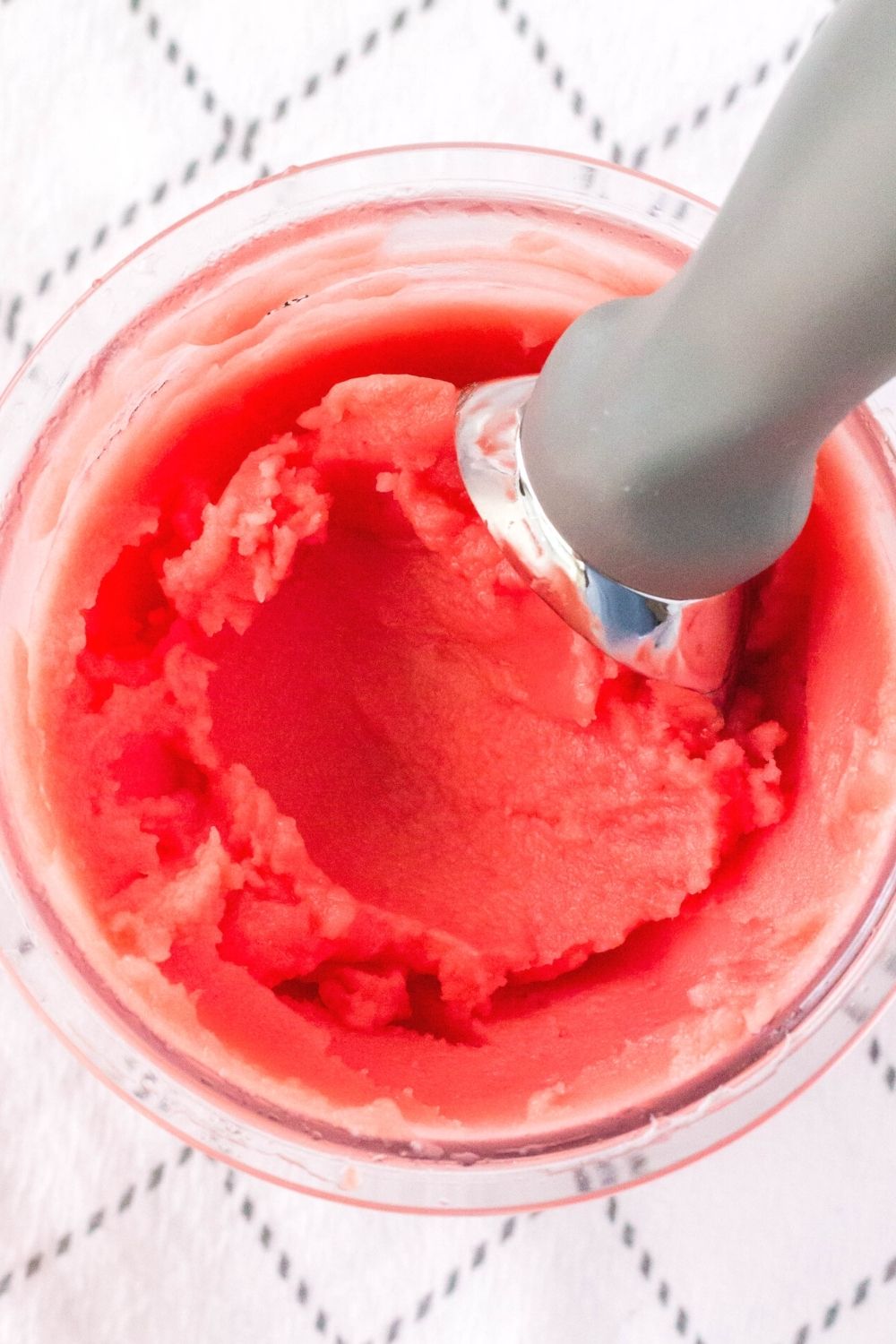 overhead view of a container of watermelon lemonade sorbet made in the Ninja Creami machine