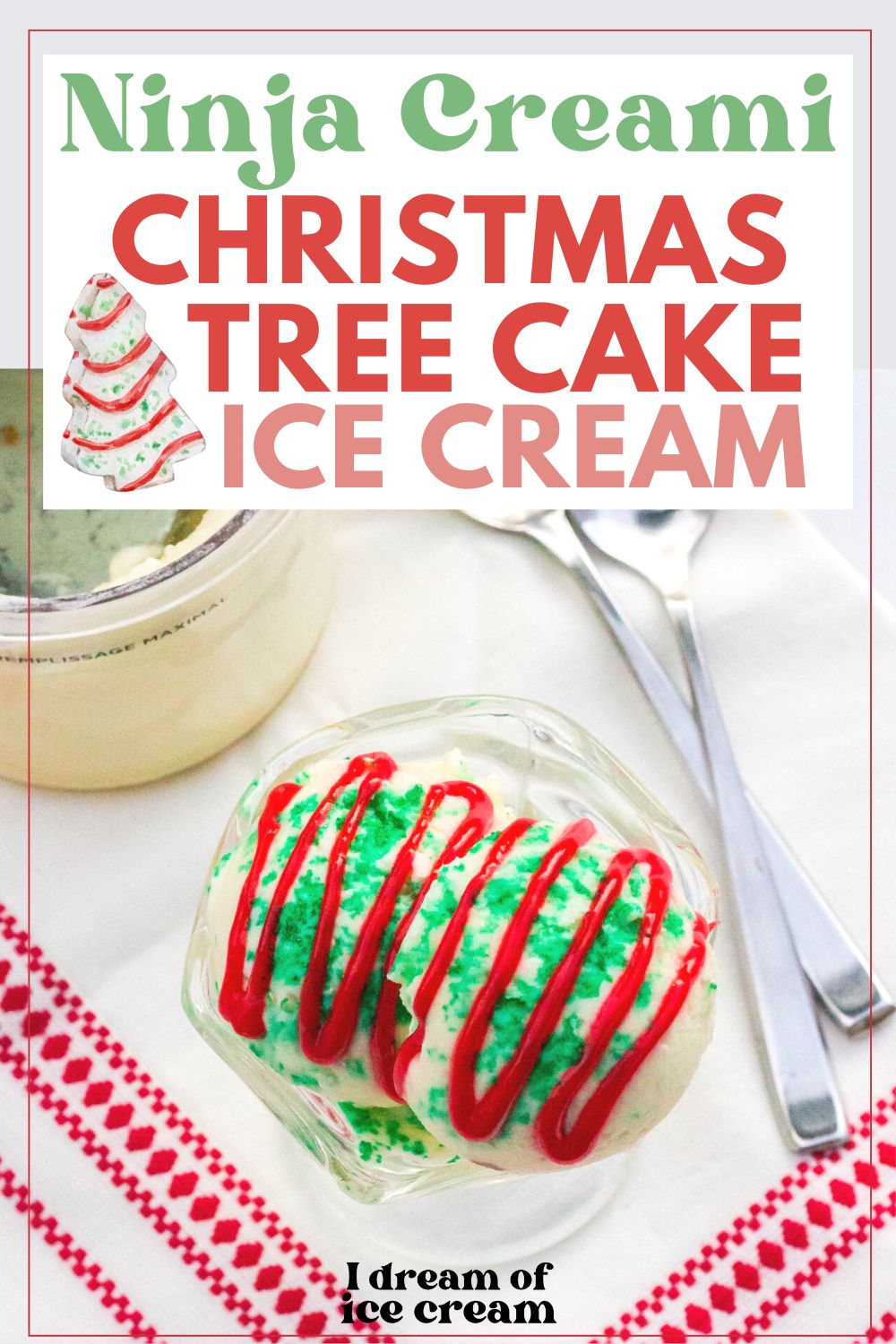 a glass dish serves Ninja Creami Christmas Tree Cake Ice Cream, topped with green sprinkles and red icing.