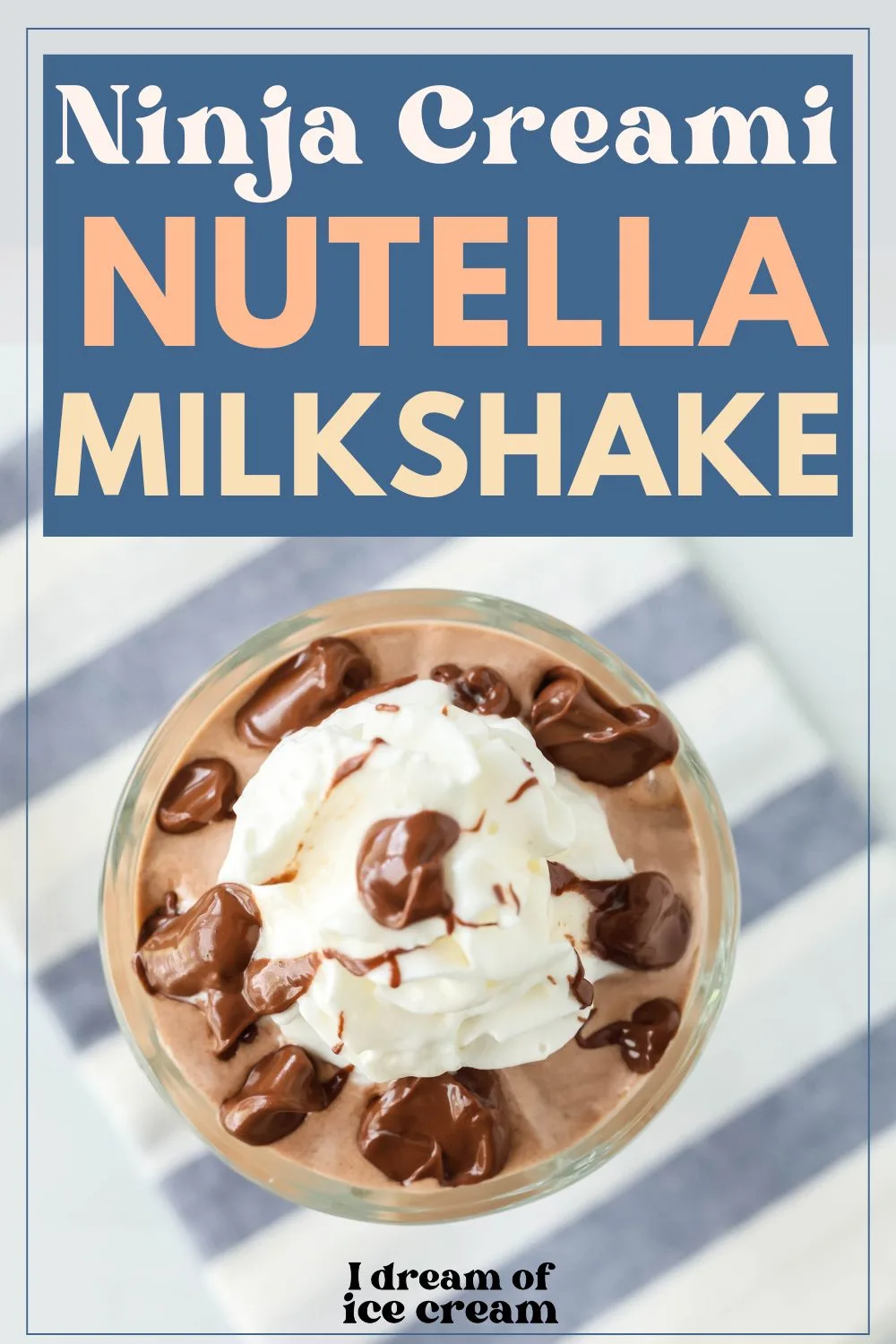 overhead view of a Ninja Creami Nutella milkshake served in a glass, garnished with whipped cream and small dollops of Nutella spread.