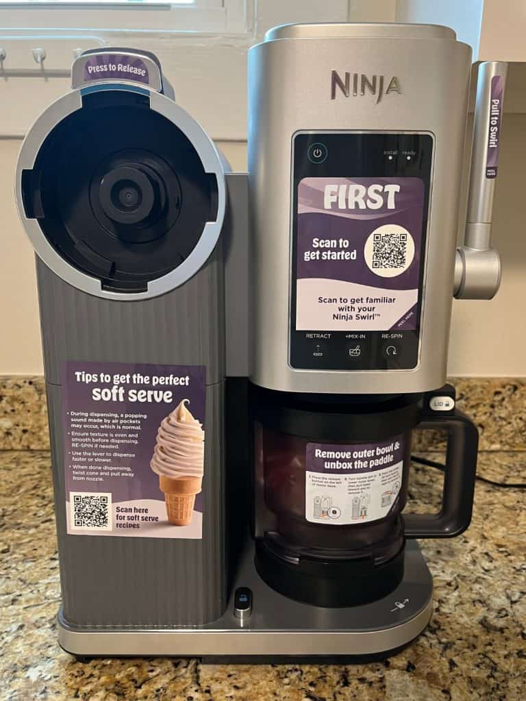 Ninja Creami Swirl machine on a kitchen counter.