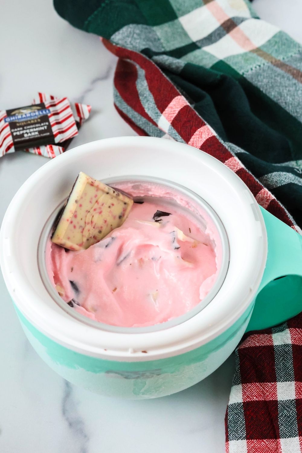 Dash My Mug Christmas ice cream garnished with peppermint bark.