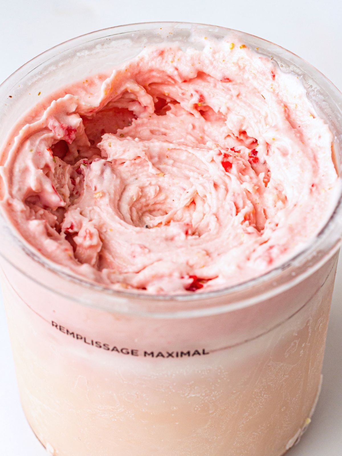 Ninja Creami strawberry cheesecake ice cream in a pint container.