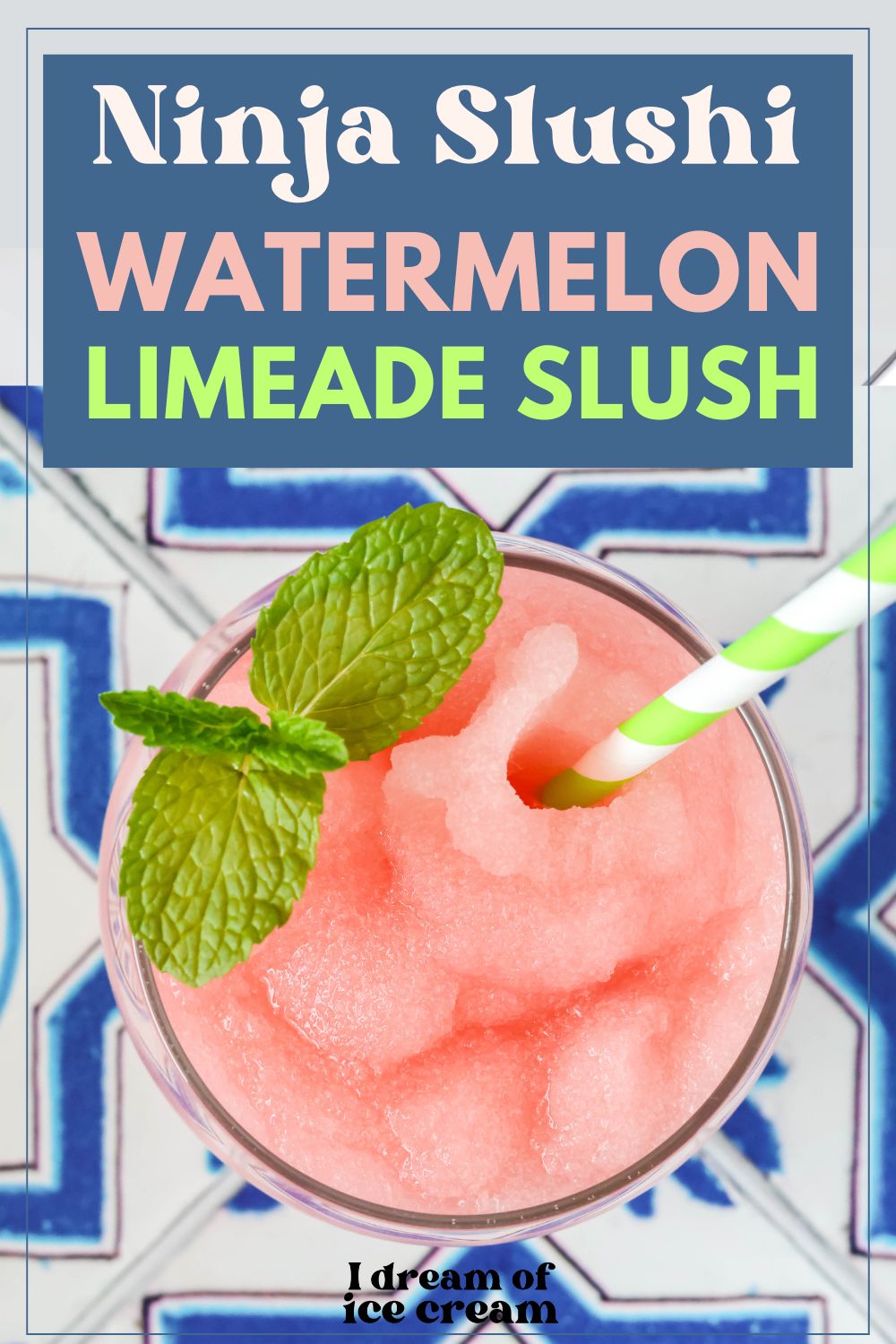overhead view of a glass of easy Ninja Slushi watermelon limeade slush, garnished with mint leaves. A green and white striped straw is in the slush.