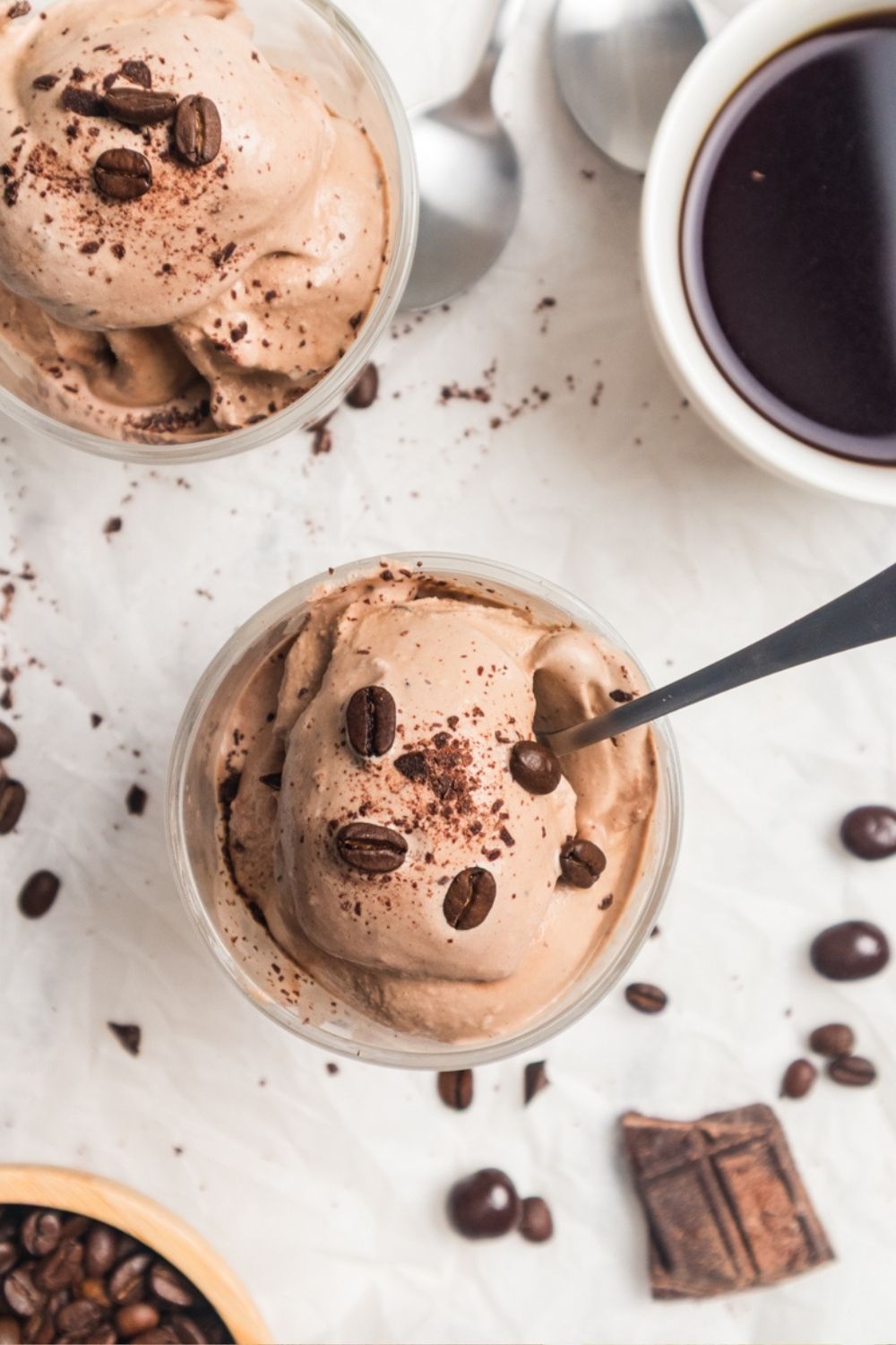 overhead view of two glass dessert cups of mocha ice cream made in the Ninja Creami machine.