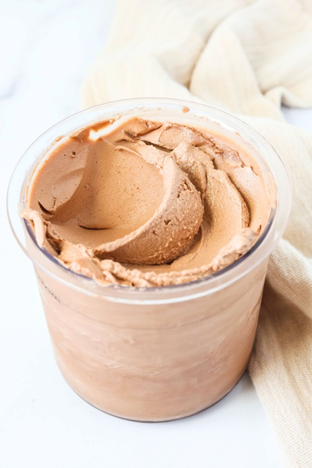 Pint of chocolate peanut butter ice cream made in the Ninja Creami machine.