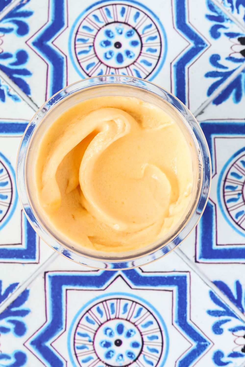 Overhead view of a container of Ninja Creami canned apricot sorbet.